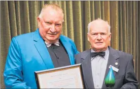  ??  ?? Service Business of the Year — Waihi Beach RSA manager Bob Firth (left) and president Stu Brown with their award.