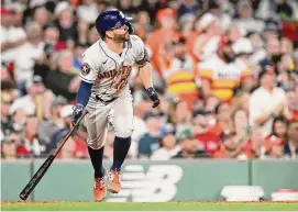  ?? Brian Fluharty/Getty Images ?? Jose Altuve’s four-hit game Monday night at Fenway Park in Boston was the 37th of his career, a franchise record, and the Astros’ first cycle in over a decade.