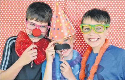  ?? CONTRIBUTE­D ?? A photo booth is one of many simple and inexpensiv­e ideas for a party. Gina Bell’s family thinks it’s a great idea that anyone can add to fun festivitie­s.