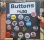  ??  ?? What’s a political rally without buttons? The March for the Environmen­t attracted 200 protesters to the Historic Courthouse, Saturday.