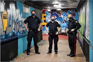  ?? SUBMITTED PHOTO ?? The Medicine Hat Police Service Downtown Patrol Unit poses for a photo in the pedestrian tunnel that goes under the tracks.