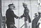  ?? EDUARDO MUNOZ ALVAREZ/AP ?? Gen. Mark Milley, chairman of the Joint Chiefs of Staff, shakes hands with a West Point graduate on Saturday.