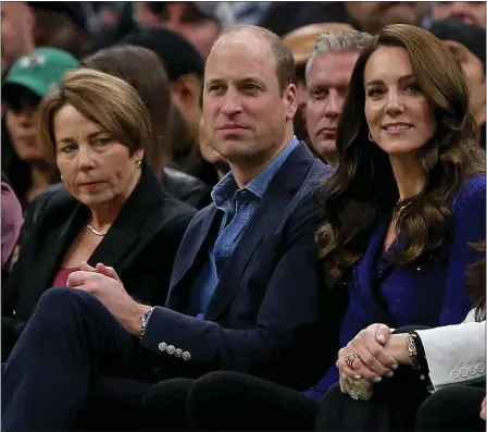  ?? ?? Prince William and Kate Middleton watch the first half of the Celtics game against the Miami Heat at the TD Garden on Nov. 30. Gov. Maura Healey, still waiting to take office, joined in for a bit. (Matt Stone/Boston Herald