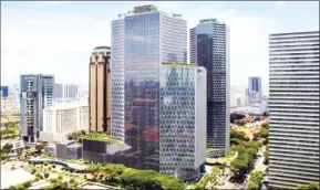  ?? M+S/THE STRAITS TIMES ?? The largest office transactio­n of the year went to Allianz Real Estate and Gaw Capital Partners, which acquired Duo Tower and Galleria for S$1.58 billion.