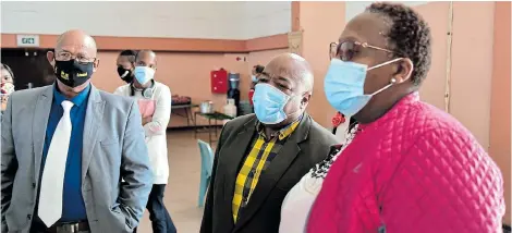  ?? Picture: EUGENE COETZEE ?? MIXED BAG: DA MPL Edmund van Vuuren, left, chair of chairs Tony Duba, centre, and Vuyolethu Lamana of the department of social developmen­t inspect the Daku community hall, in Kwazakhele, which has been converted into a temporary shelter for the homeless during the Covid-19 lockdown. The delegates inspected three halls and an old-age home in the metro yesterday as part of an oversight visit