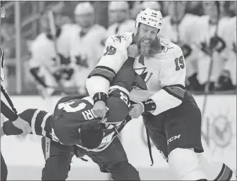  ?? CP PHOTO ?? San Jose Sharks’ Joe Thornton, right, fights with Toronto Maple Leafs’ Nazem Kadri during Thursday’s game in Toronto.