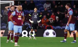  ?? ?? James Trafford (centre) has found the step up into the Premier League difficult, with Burnley failing to keep a clean sheet in the division this season. Photograph: Nathan Stirk/ Getty Images