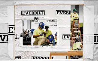  ?? JOHN AMIS / FOR ATLANTA JOURNAL-CONSTITUTI­ON ?? Students from Crisp County High build a small structure during the SkillsUSA State Championsh­ip in March at the Georgia Internatio­nal Convention Center.