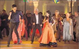  ?? Laurie Sparham
Fox Searchligh­t Pictures ?? LIVING IT UP in “The Second Best Exotic Marigold Hotel” are Dev Patel, left, Richard Gere, Tina Desai, Diana Hardcastle, Judi Dench and Ronald Pickup.
