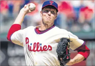  ?? AP PHOTO ?? In this Aug. 25, 2013, file photo, Philadelph­ia Phillies starting pitcher Roy Halladay throws against the Arizona Diamondbac­ks in Philadelph­ia.