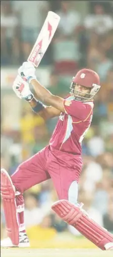  ??  ?? Left-hander Darren Bravo goes on the attack during his century yesterday.