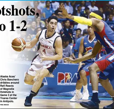  ?? PBA IMAGE ?? Alaska Aces’ Chris Banchero dribbles around Rafi Reavis of Magnolia Hotshots in Game 3 at the Ynares Center in Antipolo.