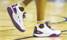  ?? Ethan Miller / Getty Images ?? Ball sported ZO2: Sho’Time sneakers by his father Lavar’s Big Baller Brand in his first NBA Summer League game Friday.