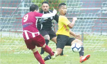  ??  ?? Bunyip’s Nicholas Yong shoots for goal against ETA Buffalo during the opening FFA match in Bunyip on Saturday afternoon.