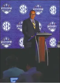  ?? The Associated Press ?? SERIOUS CONVERSATI­ON: Southeaste­rn Conference commission­er Greg Sankey speaks during the NCAA Southeaste­rn Conference Media Days Monday in Hoover, Ala. Sankey focused his address on sports gambling, officiatin­g and other weighty offthe-field matters.