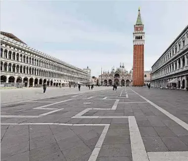  ?? Foto: AFP/LW-Archiv ?? Ein ungewohnte­s Bild – der menschenle­ere Markusplat­z in Venedig im März 2020.