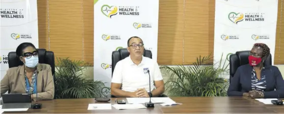  ?? (Photo: JIS) ?? Minister of Health and Wellness Dr Christophe­r Tufton (centre) addresses the virtual launch of the National Committee on Noncommuni­cable Diseases (NCDS) on Tuesday. Also pictured are director of NCDS and injury prevention in the ministry, Dr Nicola Skyers (left) and director of health promotion and protection, Dr Simone Spence.