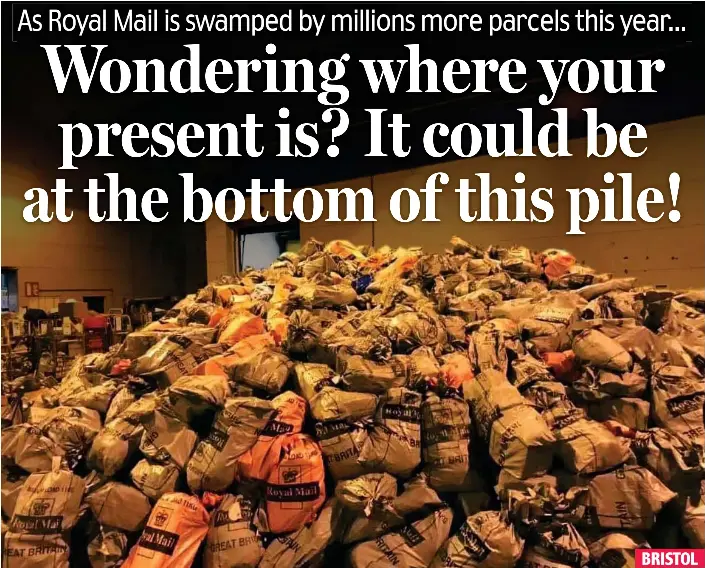  ?? ?? BRISTOL Mountainou­s: Sacks of parcels are heaped up at a Royal Mail sorting office in Bristol – as online festive shopping overtakes high street sales for the first time