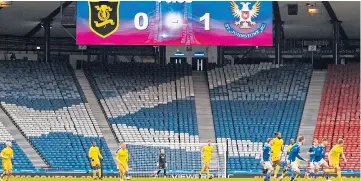  ??  ?? The Hampden scoreboard tells the story as time ticks down on yesterday’s cup final.