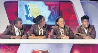  ??  ?? Kenyon Hemans/Photograph­er Manchester High School quiz team (from left): Dillon Reid (captain), Sukenia Wilson, Jodi-Ann Ellis and Ajanie Williams. They defeated Christana High School 36-23.