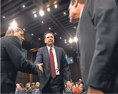  ?? JACK GRUBER, USA TODAY ?? Former FBI director James Comey arrives to testify in front of the Senate Intelligen­ce Committee.