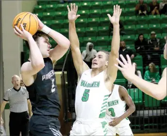  ?? Mark Ross/Special to the Herald-Leader ?? Siloam Springs senior Dalton Newman (left) looks to make a play as Van Buren’s Malachi Henry guards during Monday’s game at Clair Bates Arena in Van Buren. Newman scored the go-ahead basket as the Panthers clipped the Pointers 36-34.