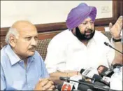  ?? HT PHOTO ?? Punjab chief minister Capt Amarinder Singh health minister Brahm Mohindra addressing the media in Chandigarh on Monday.