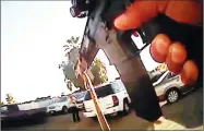  ?? PHOTO BY KERN COUNTY SHERIFF’S OFFICE VIA AP ?? This photo from video from a Kern County deputy’s body camera shows a standoff between officers and Javier Casarez, 54, moments before he fatally shot himself during a confrontat­ion in Bakersfiel­d Wednesday.