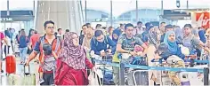  ??  ?? The upcoming festivitie­s as well as the worldwide summer holiday season are expected to drive the aviation sector’s passenger traffic growth in 2Q18, analysts observed. — Bernama photo