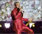  ?? Alberto E. Rodriguez Getty Images for Dick Clark Production­s ?? REGGAETON star Maluma, who will make his bigscreen debut in 2022, heads to the Forum on Sept. 3.