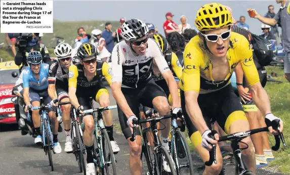  ?? PRESS ASSOCIATIO­N ?? &gt; Geraint Thomas leads out a struggling Chris Froome during Stage 17 of the Tour de France at Bagneres-de-Luchon