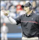  ?? BOB LEVERONE / AP ?? After a disappoint­ing 2015 debut, Dan Quinn doubled down on everything and is reaping the benefits.