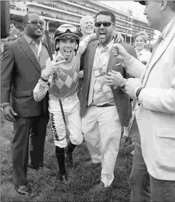  ?? BARBARA D. LIVINGSTON ?? Owner Sol Kumin celebrates with jockey Florent Geroux after Monomoy Girl wins this year’s Kentucky Oaks. She is a leading contender in Saturday’s BC Distaff.