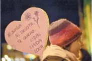  ?? ALVARO BARRIENTOS /ASSOCIATED PRESS ?? A demonstrat­or’s sign reads ”Not submissive. Not devotee. I want you to be free, beautiful and crazy,” while protesting male violence against women.