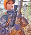  ?? PHOTO BY LARRY CASE ?? Jesse Scott from Alvon, W.Va., hunts with a Ruger 84M Hunter model rifle in .257 Roberts, and a German Precision Optics 3x9 scope.