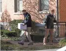  ?? ADAM CAIRNS/COLUMBUS DISPATCH ?? FBI agents remove items from the home of former PUCO Chairman Sam Randazzo in November.