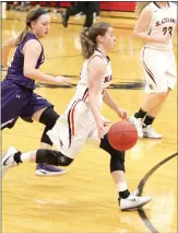 ?? Photograph­s courtesy of Russ Wilson ?? Senior Lady Blackhawk Jennifer Anthony drives down the court during Friday night’s game against the Lady Elks. Anthony scored 9 points in the heated contest.