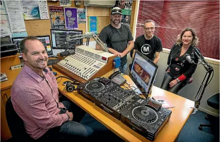  ?? GRANT MATTHEW/STUFF ?? Taranaki FM Trustees Warwick Foy, Mark Dickie, Andy Bassett and Kelly Loney are happy the station has made a profit.