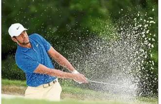  ??  ?? Blasting off: American Tony Finau playing a shot from a bunker on the fifth hole during the first round of the Charles Schwab Challenge at the Colonial on Thursday. — AFP