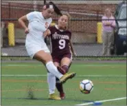  ?? AUSTIN HERTZOG - DIGITAL FIRST MEDIA ?? Perkiomen Valley’s Alison Devers (5) clears the ball as Pottsgrove’s Anna Crater pressures during Tuesday’s PAC crossover game. Devers scored the lone goal in PV’s 1-0 win.