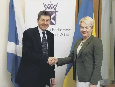  ??  ?? 0 Natalia Galibarenk­o meets Holyrood’s presiding officer Ken Macintosh