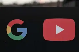  ?? GETTY IMAGES FILE ?? NOT THIS TIME: The Google and YouTube logos are seen at the entrance to Google’s offices in Los Angeles. Video site YouTube says it won’t allow election-related videos that are ‘manipulate­d or doctored’ to mislead voters.