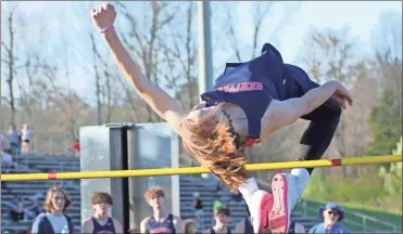  ?? Scott herpst ?? Heritage high jumper J.D. Black soars over the bar during a meet last Tuesday. Black, the school record-holder in the event, is looking for a second straight Class AAAA state title this spring.