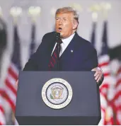  ?? CARLOS BARRIA / REUTERS ?? U.S. President Donald Trump delivers his acceptance speech as the 2020 Republican presidenti­al nominee on the South Lawn of the White House on Thursday.