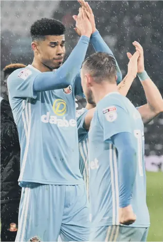  ??  ?? Ashley Fletcher applauds the Sunderland fans at Pride Park following Friday night’s victory.
