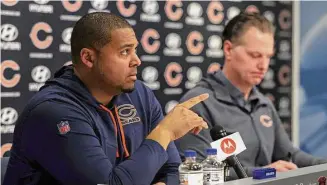  ?? Stacey Wescott/TNS ?? Bears general manager Ryan Poles, left, and coach Matt Eberflus speak to the media during an end-of-season news conference in January.