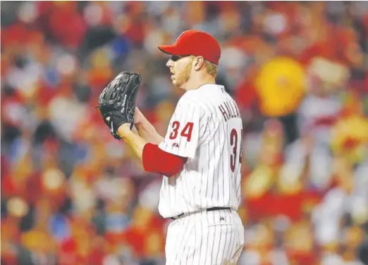  ??  ?? Roy Halladay, of the Philadelph­ia Phillies, shown during the playoff no-hitter he pitched in 2010 against the Cincinnati Reds.