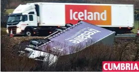  ??  ?? CUMBRIA Lucky: This HGV’s driver was unhurt when it blew off the M6