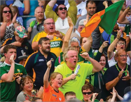 ??  ?? A group of Kerry supporters applaud their side off the pitch following a draw in the GAA Football All-Ireland Senior Championsh­ip Quarter-Final Group 1 Phase 2 match between Monaghan and Kerry at St Tiernach’s Park in Clones Photo by Ramsey Cardy / Sportsfile