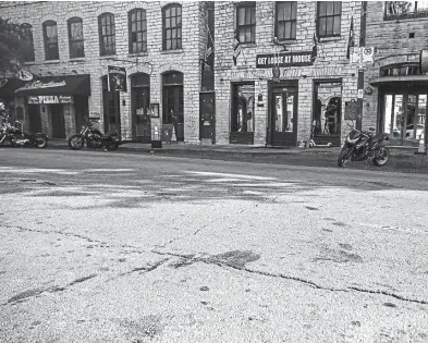  ?? AP ?? ‘EVERYONE GOT ON THE GROUND’: Blood stains remain on 6th Street after an early morning shooting on Saturday in downtown Austin, Texas. Authoritie­s say someone opened fire in the busy entertainm­ent district, wounding several people before getting away.